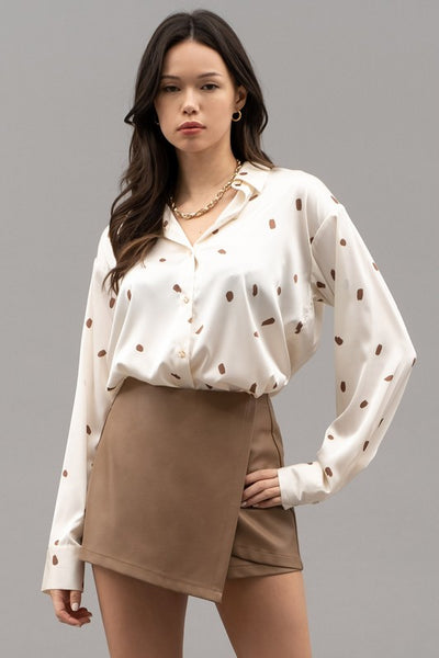 the Veda brush stroked Button up top