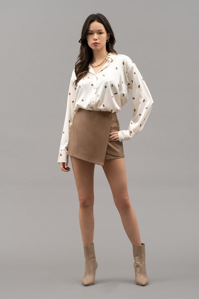 the Veda brush stroked Button up top