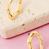 Warped Oval Cutout Stud Earrings