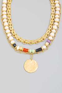 Layered beaded disc necklace